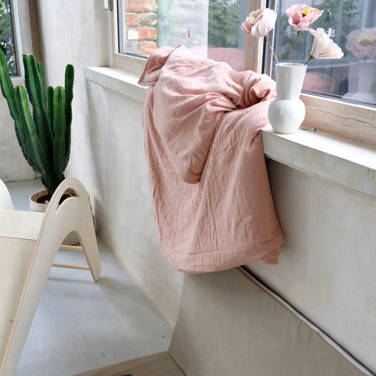 Couverture moelleuse couleur rose 