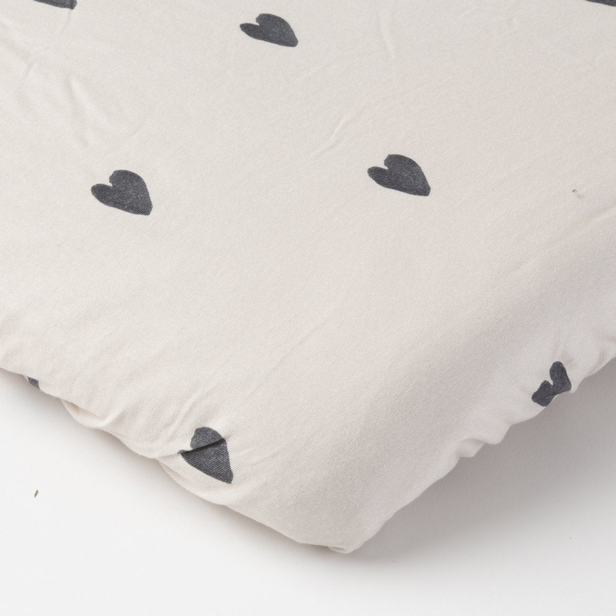 La housse de matelas à langer jersey motif coeur